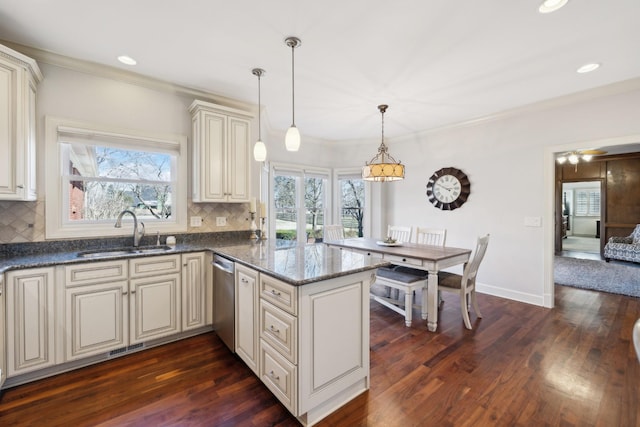 1608 Knox Dr, Brentwood, TN 37027 - kitchen featuring dark wood finished floors, backsplash, and a sink