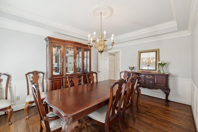 1608 Knox Dr, Brentwood, TN 37027 - dining space featuring dark wood-style floors, baseboards, a tray ceiling, ornamental molding, and a notable chandelier