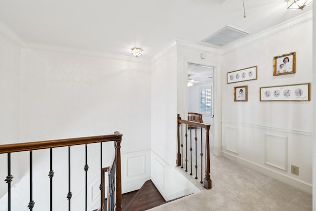 1608 Knox Dr, Brentwood, TN 37027 - hallway featuring visible vents, carpet floors, ornamental molding, a decorative wall, and an upstairs landing