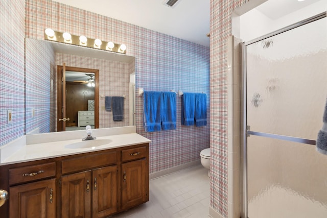 1608 Knox Dr, Brentwood, TN 37027 - bathroom featuring tile patterned flooring, a shower stall, wallpapered walls, and toilet