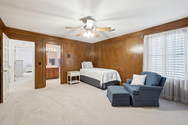 1608 Knox Dr, Brentwood, TN 37027 - bedroom with visible vents, light carpet, ensuite bathroom, a ceiling fan, and wood walls