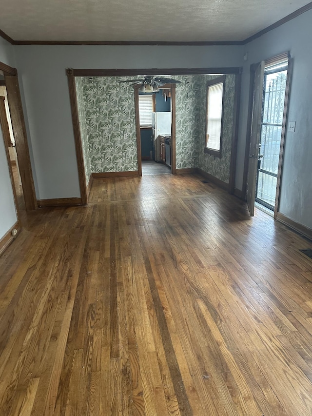 26 Central Ave, Tullahoma, TN 37388 - interior space with ornamental molding, baseboards, hardwood / wood-style flooring, and a healthy amount of sunlight