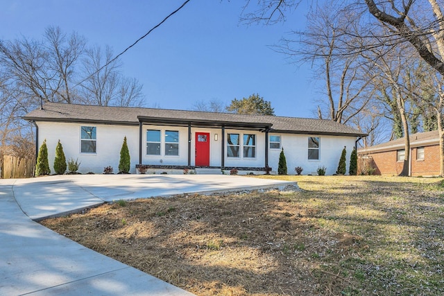 ranch-style house with brick siding