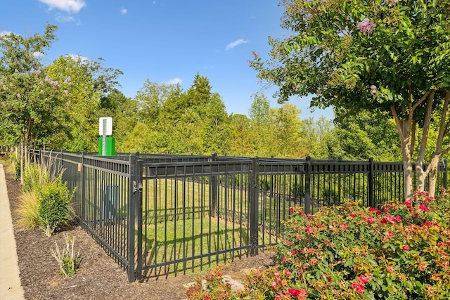 view of gate featuring fence