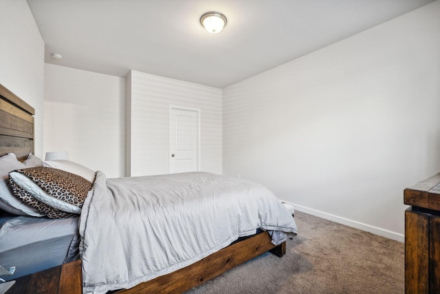 carpeted bedroom with baseboards