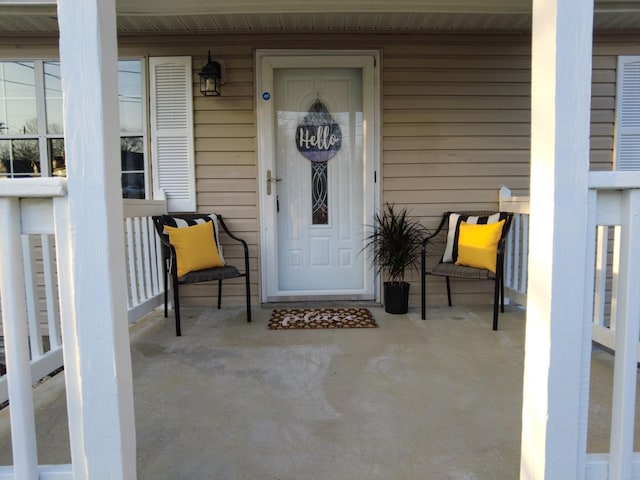 doorway to property featuring a porch