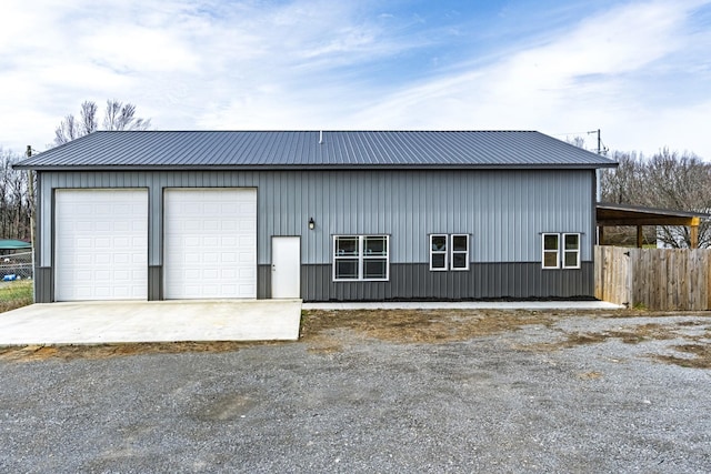 detached garage with fence