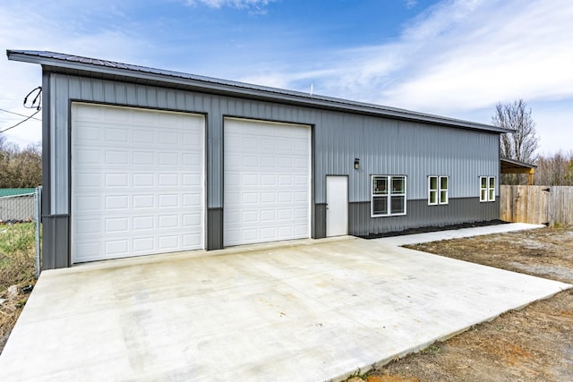 detached garage with fence