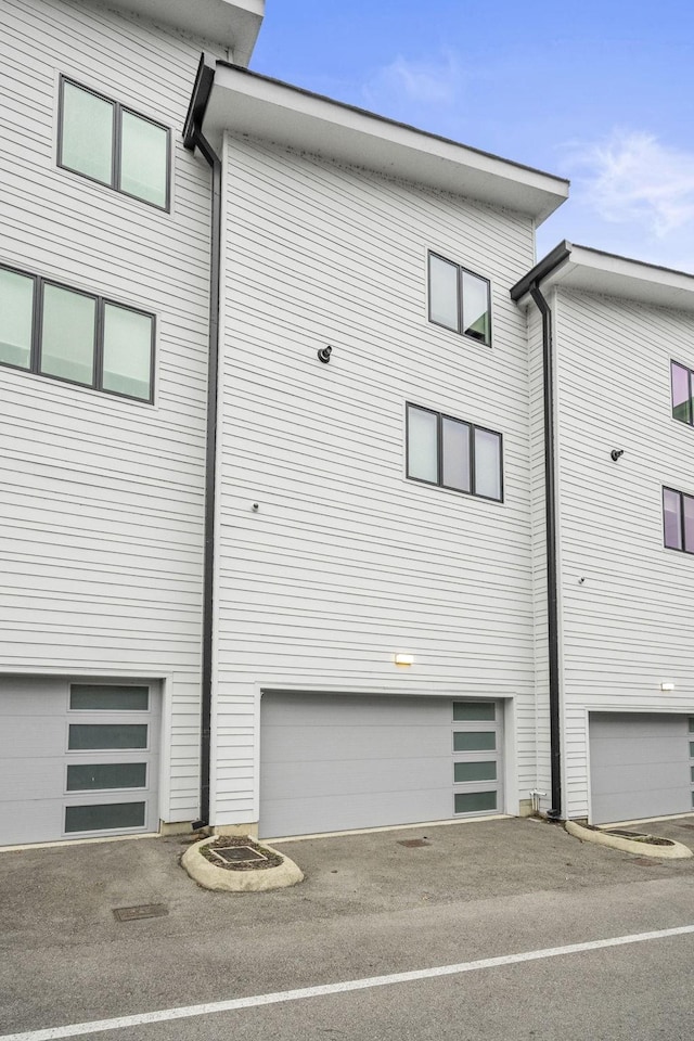 view of home's exterior with a garage