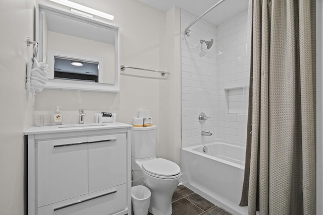 bathroom featuring shower / bath combo, vanity, and toilet