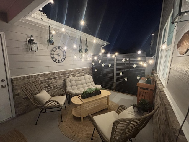 view of balcony at twilight