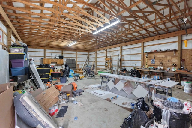 garage with a workshop area