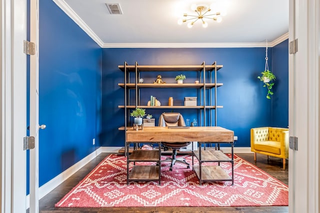 office space with baseboards, wood finished floors, visible vents, and crown molding