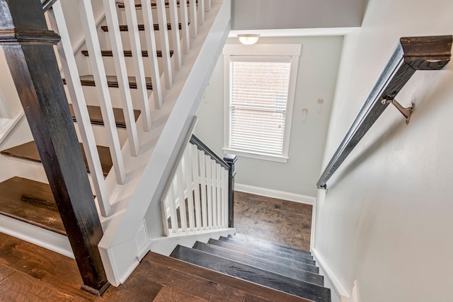 stairs featuring baseboards