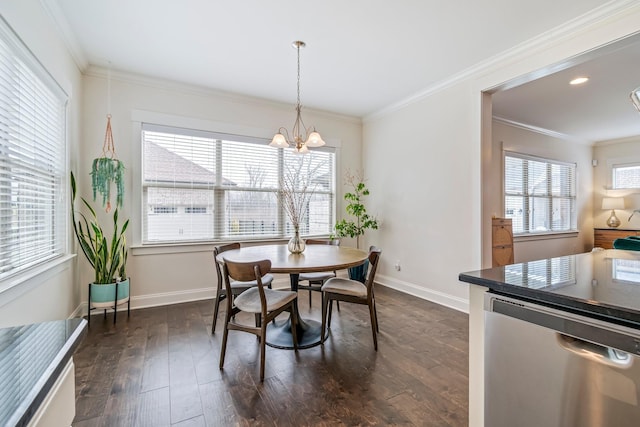 dining area with ornamental molding, a healthy amount of sunlight, and dark wood finished floors