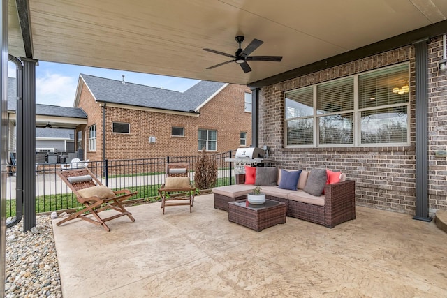 view of patio / terrace with a ceiling fan, fence, and an outdoor hangout area