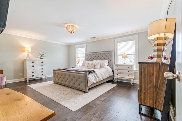 bedroom with baseboards, dark wood-style flooring, visible vents, and crown molding