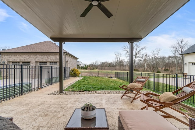 view of patio / terrace with ceiling fan and a fenced backyard