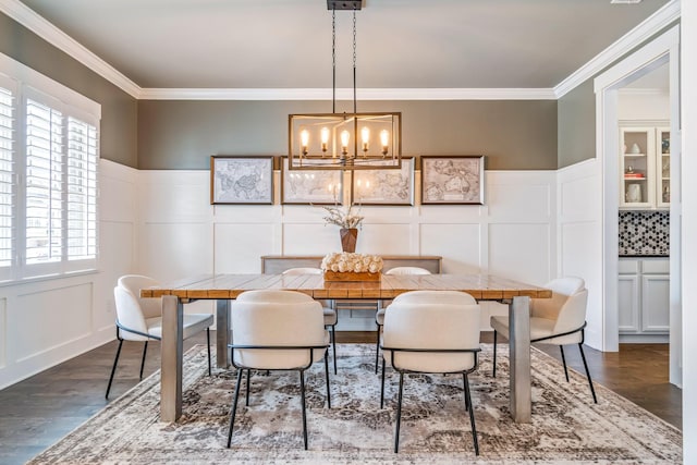 3038 Farmhouse Dr, Franklin, TN 37067 - dining area with a notable chandelier, a decorative wall, crown molding, and wood finished floors