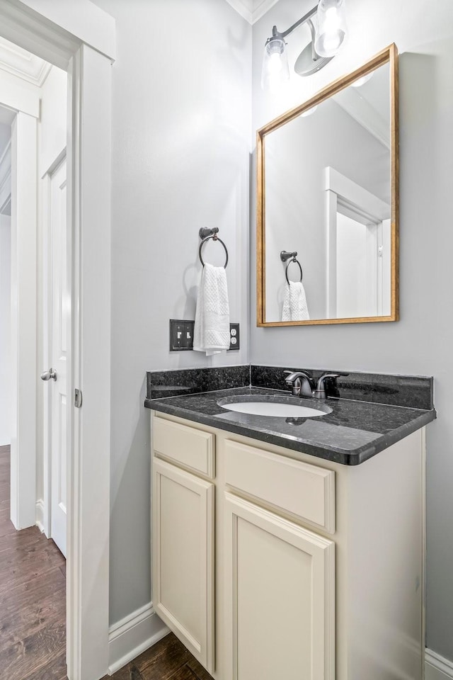 3038 Farmhouse Dr, Franklin, TN 37067 - bathroom with vanity, wood finished floors, and baseboards