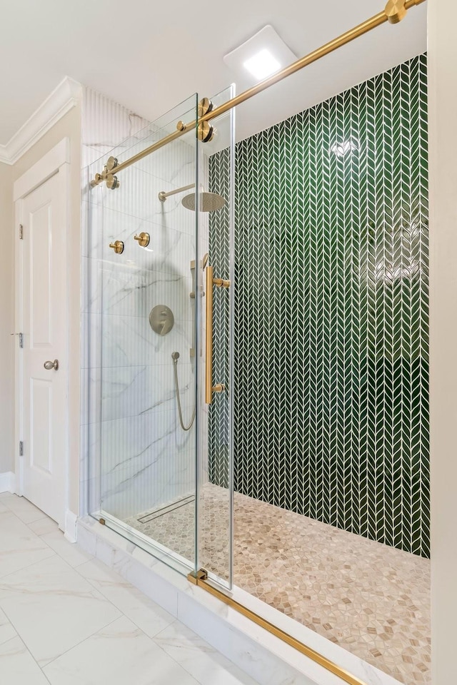 3038 Farmhouse Dr, Franklin, TN 37067 - bathroom featuring a stall shower, marble finish floor, and ornamental molding