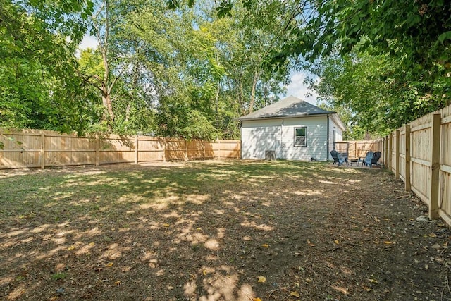 view of yard featuring a fenced backyard