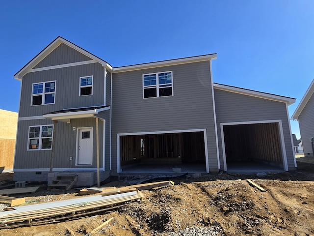 view of front of property featuring an attached garage