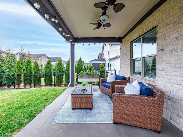 view of patio / terrace featuring fence, outdoor lounge area, and a ceiling fan