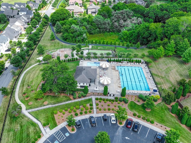 birds eye view of property with a residential view