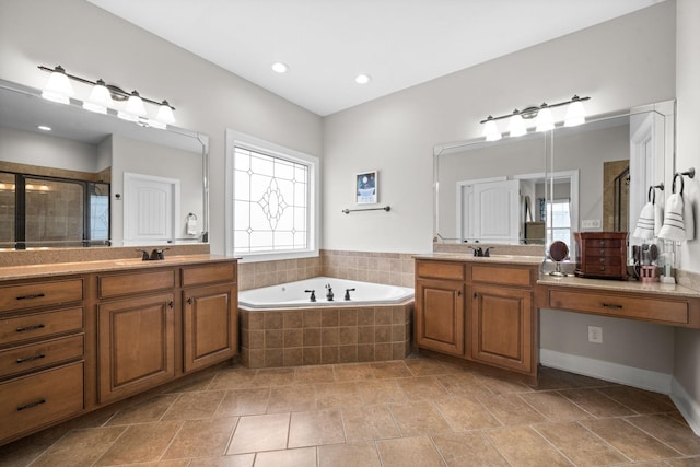 full bath featuring a sink, a bath, and a shower stall