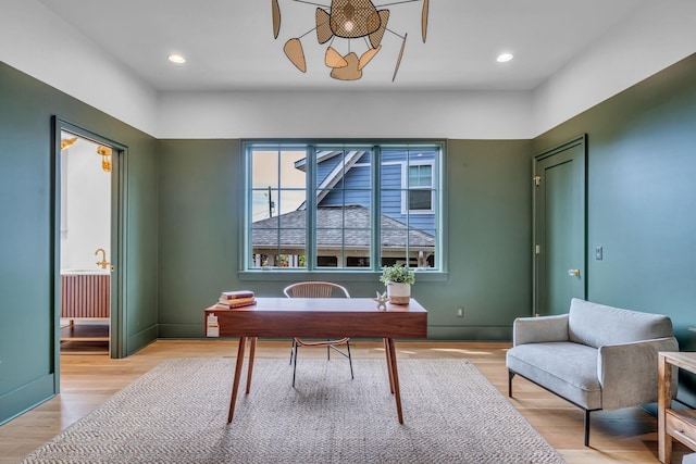 home office featuring a ceiling fan, recessed lighting, baseboards, and light wood finished floors