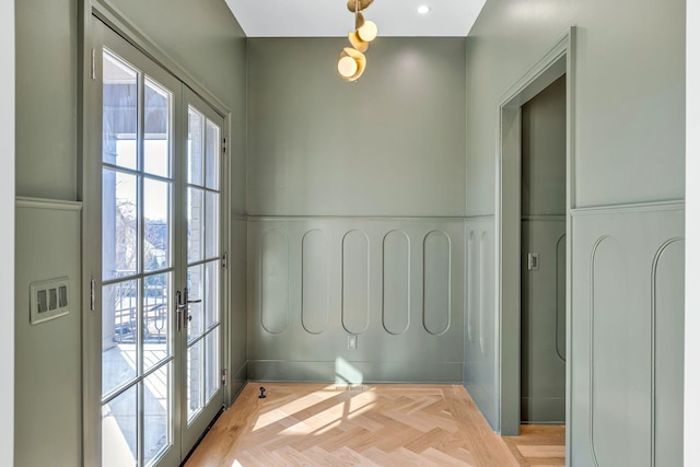 entryway featuring french doors