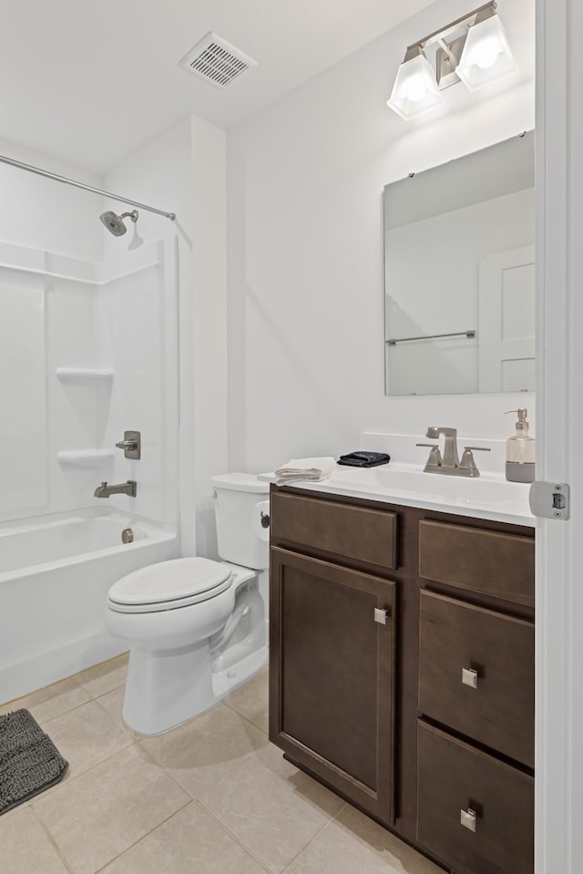 bathroom with visible vents, shower / bathing tub combination, toilet, vanity, and tile patterned floors