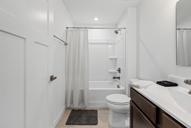 full bathroom with shower / tub combo with curtain, vanity, toilet, and tile patterned floors