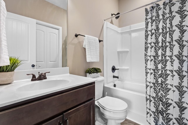 bathroom with toilet, shower / bathtub combination with curtain, and vanity