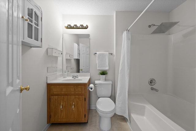 bathroom with toilet, shower / tub combo with curtain, tile patterned flooring, a textured ceiling, and vanity