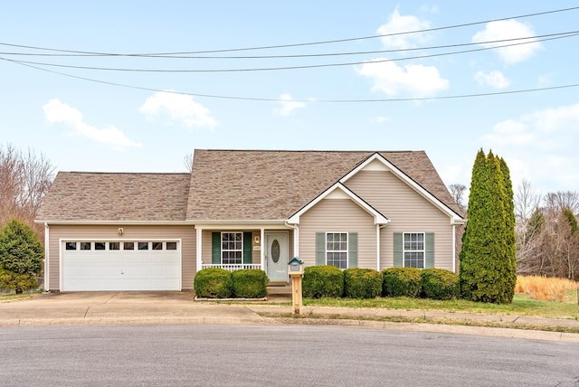 view of front of home featuring a porch, driveway, a shingled roof, and a garage