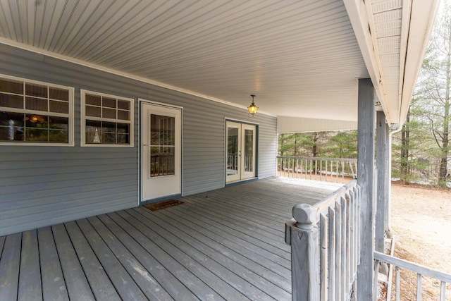 wooden terrace featuring french doors