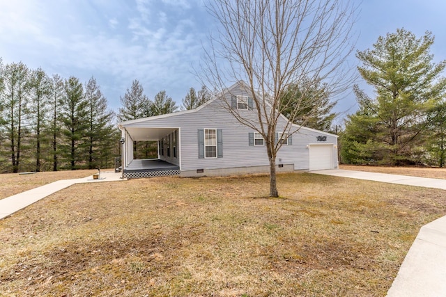 view of front of house with crawl space, an attached garage, concrete driveway, and a front yard