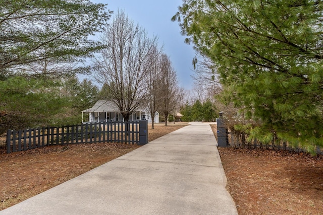 view of community featuring a fenced front yard