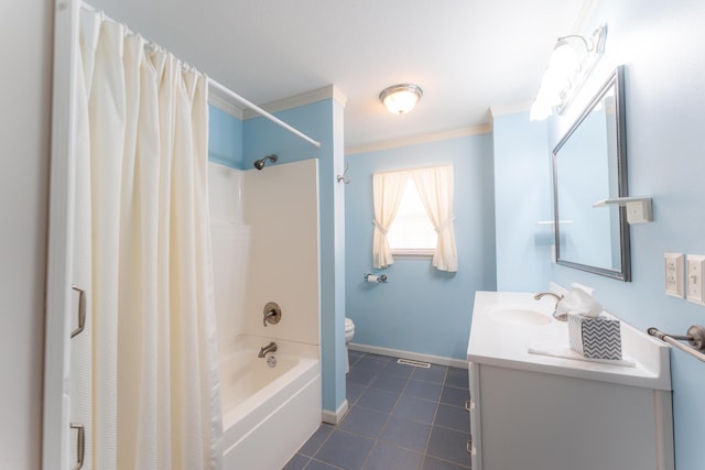 bathroom featuring toilet, vanity, baseboards, ornamental molding, and tile patterned floors