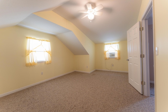 bonus room featuring carpet, cooling unit, vaulted ceiling, and ceiling fan