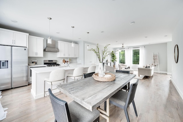 dining room featuring recessed lighting, baseboards, light wood-type flooring, and ceiling fan