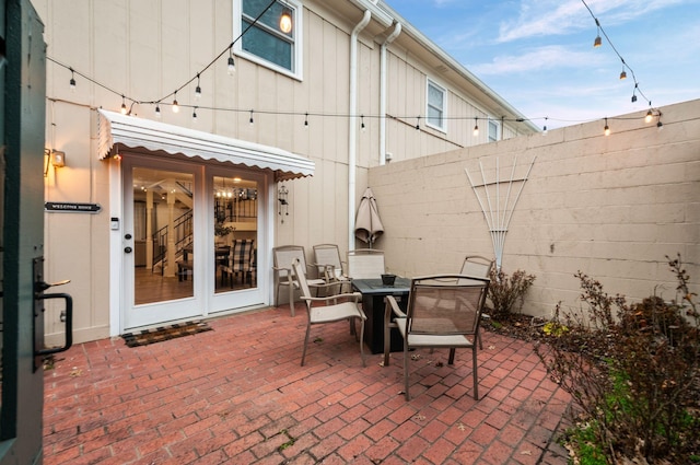 view of patio / terrace with outdoor dining space and a fenced backyard