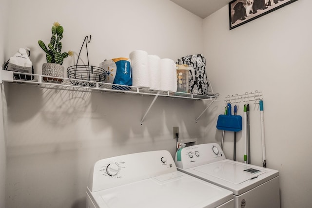 laundry room featuring laundry area and separate washer and dryer