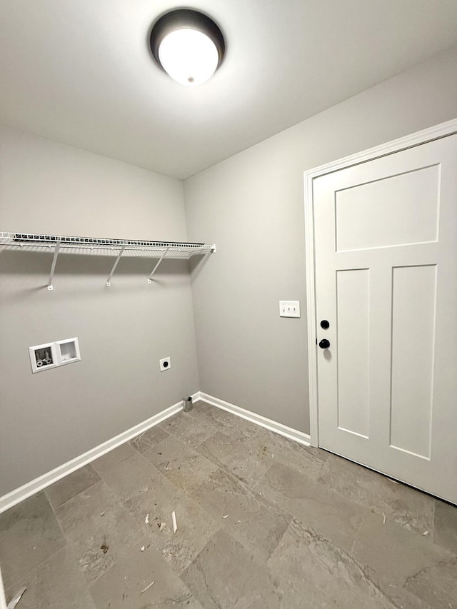 laundry area with laundry area, hookup for a washing machine, baseboards, and electric dryer hookup