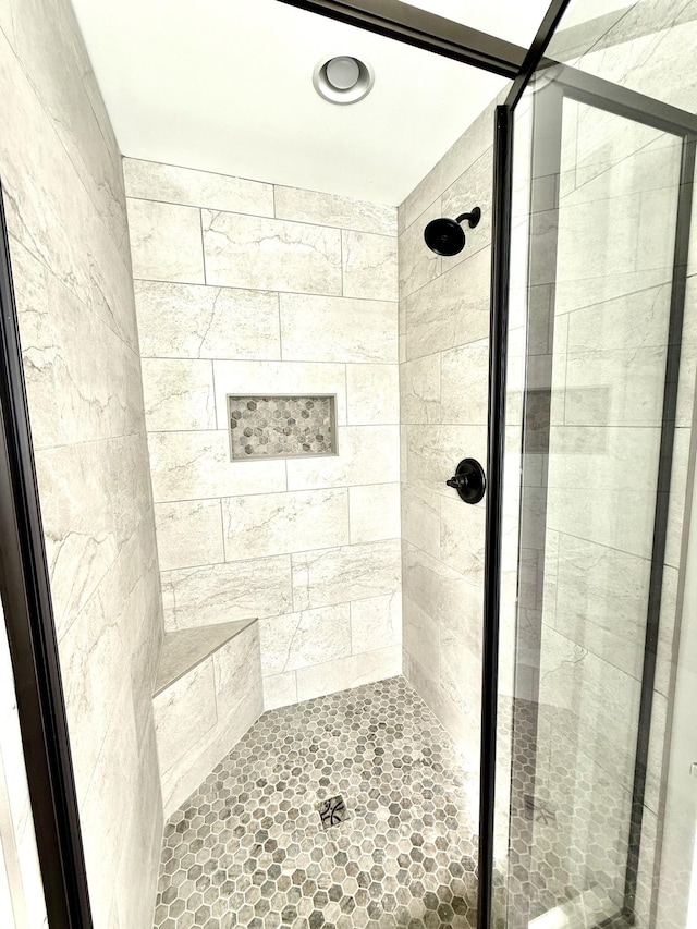 full bath featuring a stall shower