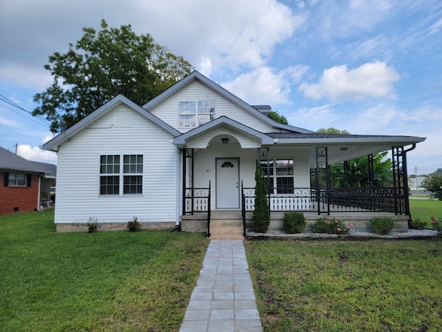 bungalow-style home featuring a porch and a front yard