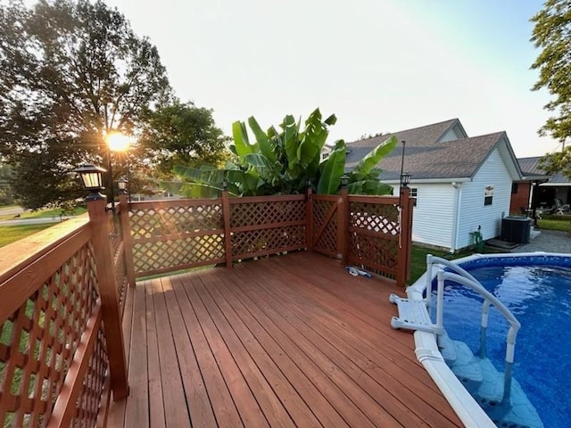 deck with cooling unit and an outdoor pool