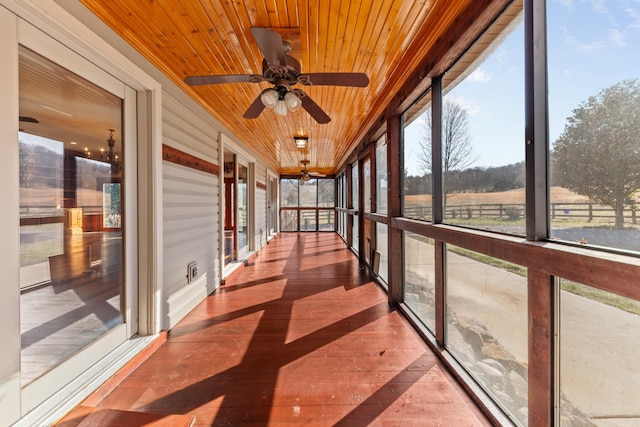 unfurnished sunroom featuring wood ceiling